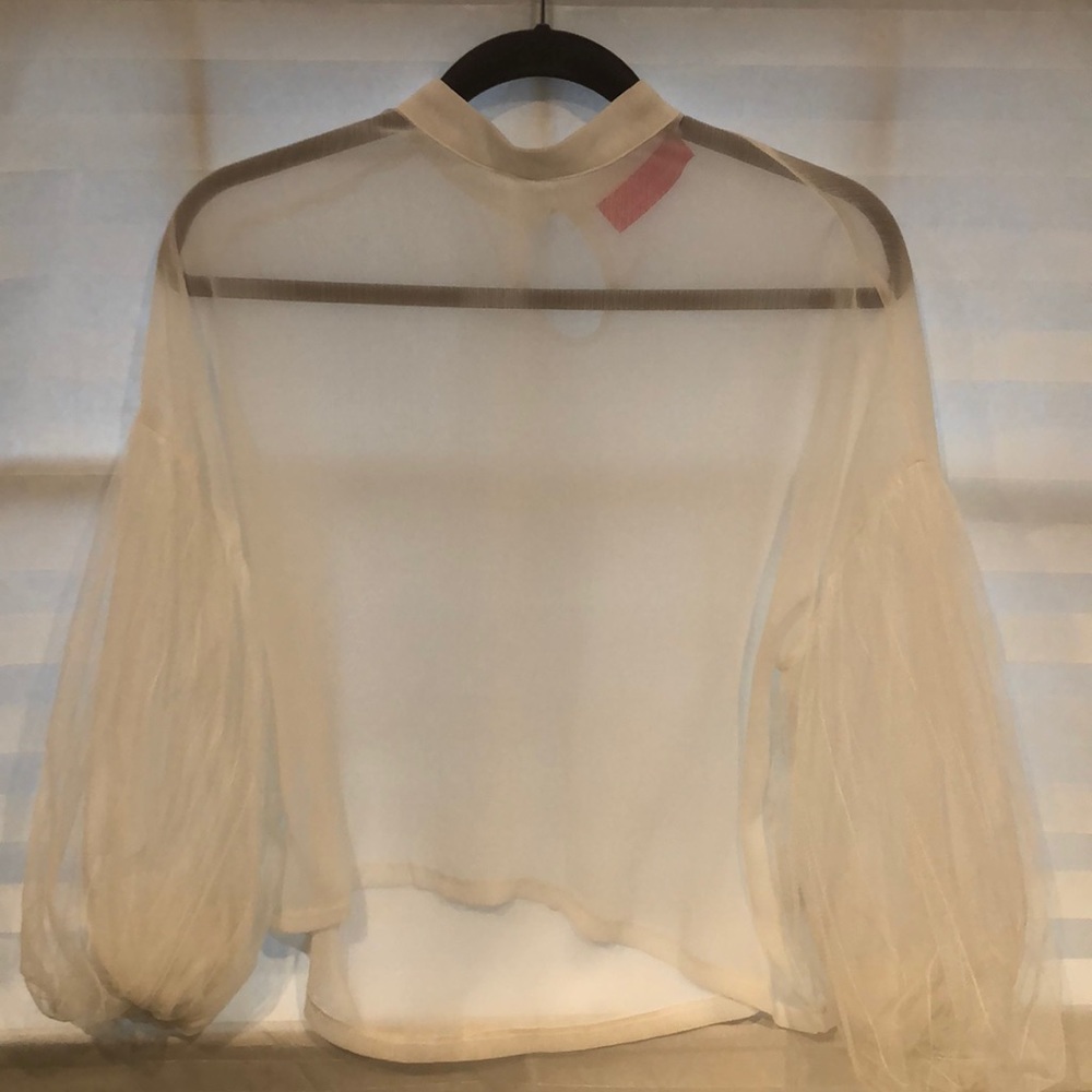 White blouse with detailed puffy sleeves